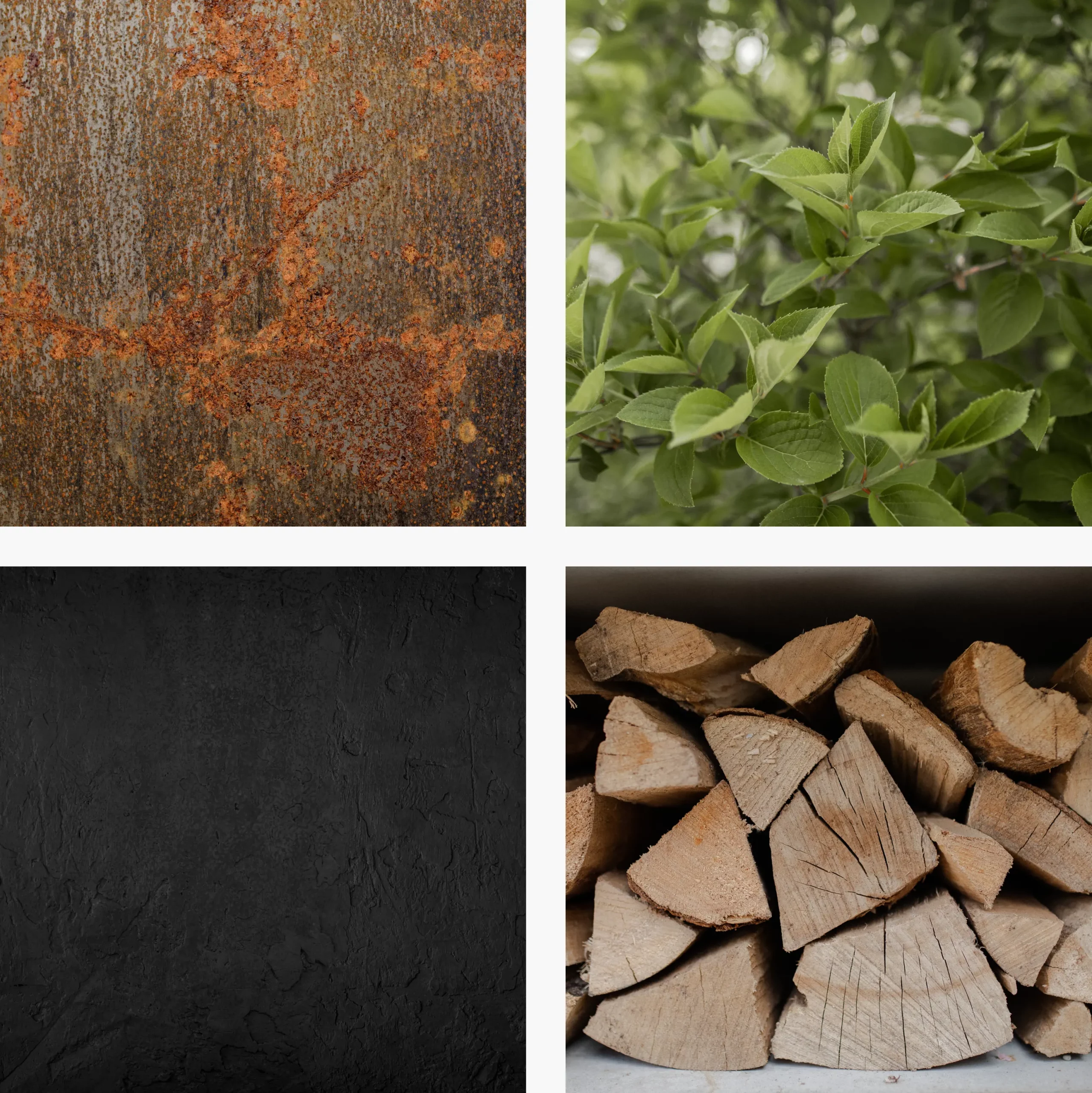 Moodboard aus Schiefer, Blättern, Holz und Cortenstahl